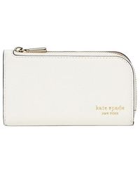 Kate Spade - Devin Pebbled Leather Small Slim Bifold Wallet Wallet Handbags, Leather/Suede - Lyst