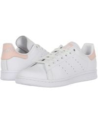 adidas originals stan smith sneakers with reptile back counter