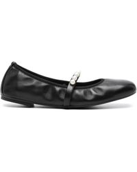 Stuart Weitzman - Goldene Schwarze Flache Schuhe Mit Perlendetail - Lyst