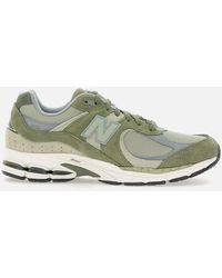 New Balance - U2002 Olivgrüne Sneakers - Lyst