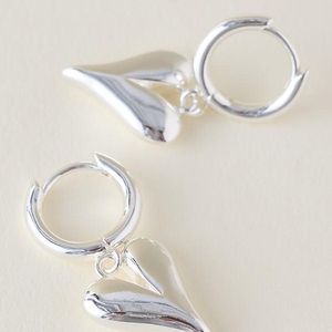By Anthropologie Natural Puffy Heart Huggie Hoop Earrings