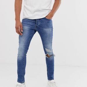 Jeans skinny con strappi di Mennace in Blu da Uomo