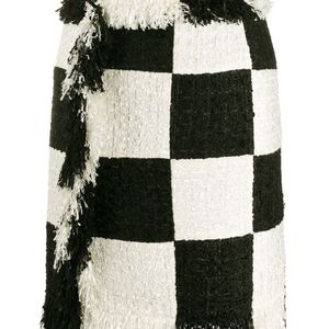 Minijupe frangée à carreaux MSGM en coloris Noir