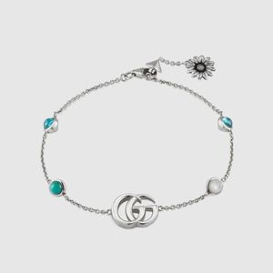 Gucci Mettallic Armband mit Doppel G und Perlmutt