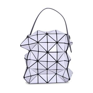 Issey Miyake Blue Handbags