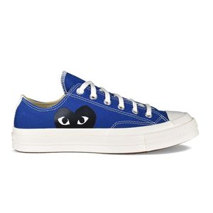 Comme des Garçons Blue Chuck Taylor Sneakers