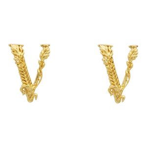 Versace ゴールド V スタッド ピアス メタリック