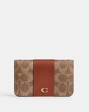 COACH Tarjetero Essential Slim En Lona De Firma - Blanco