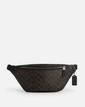 COACH Riñonera Warren de lona de firma - Negro