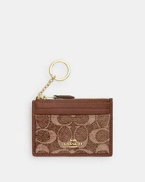 COACH Mini Funda Porta-Id Skinny En Chenilla Signature En Castaño - Negro