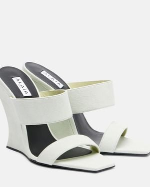 Alaïa Wave 110 Suede Wedge Mules - Metallic