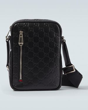 Gucci 'Emblem' Crossbody Bag With Adjustable Shoulder Strap And All-Over Embossed Gg Motif - Black