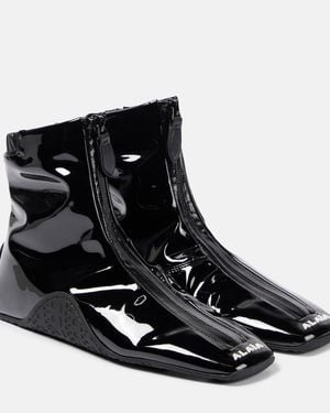 Alaïa Trainer Faux Patent Leather Ankle Boots - Black