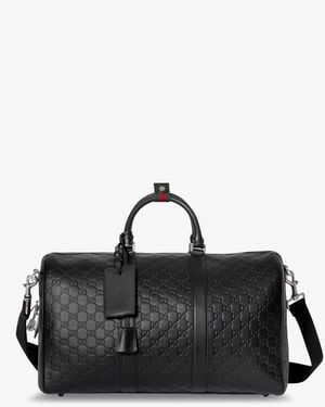 Gucci Coated Canvas Gg Emblem Travel Bag With Gg Motif - Black