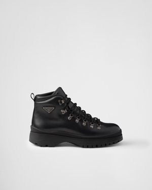 Prada "Brixxen" Lace Up Ankle Boots - Black