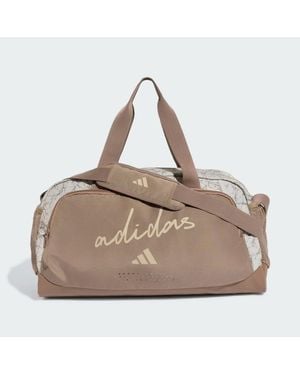 adidas Defender Allover Graphic Duffle Bag S - Natural