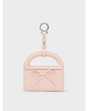 Charles & Keith Reese Wristlet Mit Schleife Und Tragegriff - Pink