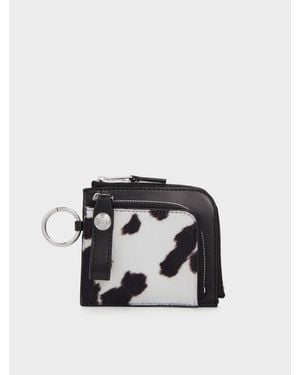 Charles & Keith Vega Furry Cow-Print Zip-Around Pouch - Black