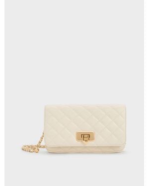 Charles & Keith Cressida Gesteppte Clutch Mit Push-Lock-Verschluss - Natur
