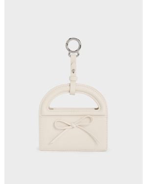 Charles & Keith Reese Wristlet Mit Schleife Und Tragegriff - Natur