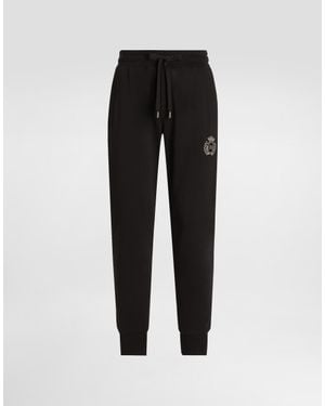 Dolce & Gabbana Jersey Trousers With Heraldic Patch - Black