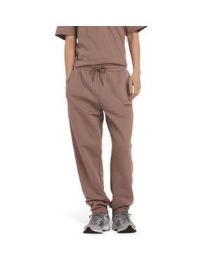 New Balance Linear Graphic Pant Hombre Pantalones - Marrón