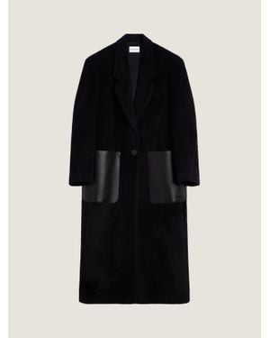 Givenchy Cappotto lungo in lana dall'aspetto peloso con tasche in pelle - Nero
