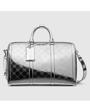Gucci Mittelgroße Reisetasche Mit Gg Prägung - Mettallic