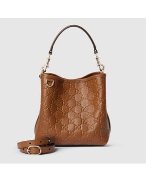 Gucci Gg Emblem Small Bucket Bag, Leather - Brown