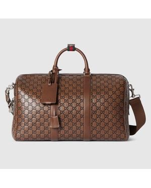 Gucci Mittelgroße Gg Emblem Reisetasche - Braun