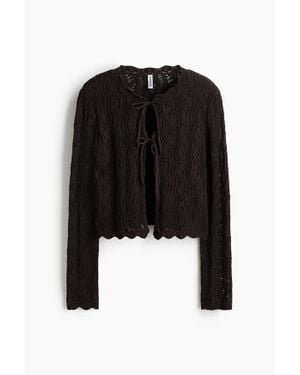 H&M Gilet en maille pointelle avec liens à nouer - Noir