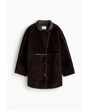H&M Manteau duveteux - Noir
