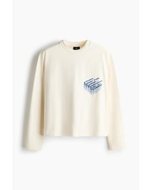 H&M T-shirt Oversized Fit en jersey imprimé - Neutre