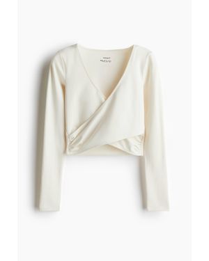 H&M Top de sport croisé SoftMoveTM - Blanc