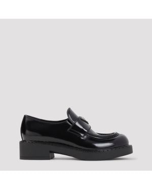 Prada Calf Leather & Rubber Slip-On Loafers With Signature Print Motif (Fall/Winter 2026) - Black