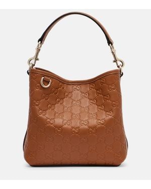 Gucci Gg Emblem Small Leather Bucket Bag - Brown