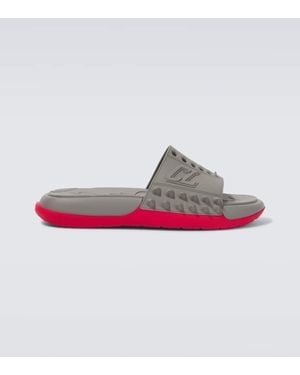 サンダル Christian Louboutin  Take It Easy perforated spiked slides Take It Easy spiked slides in black - Christian Louboutin