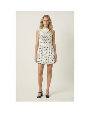 Modenaire Sleeveless Smocked Mini Dress With High Neckline - White