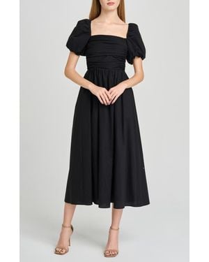 off the shoulder pom pom dress Printed Off-Shoulder Pom Pom Dress – Chic & Stylish 18