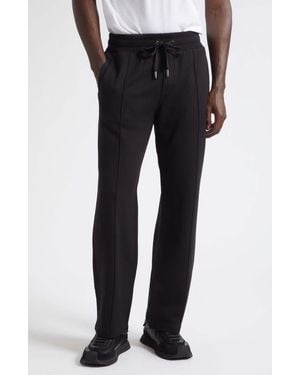 Dolce & Gabbana Logo Plate Pants - Blue