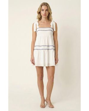 Modenaire Sleeveless Tiered Mini Dress With Bow Tie Shoulder Straps And Smocked Empire Waist - Natural