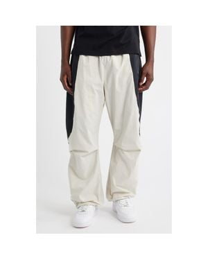 Nike Tech Dri-Fit Woven Oversize Stretch Nylon Pants - Natural