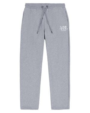 L/AB Off White Diagonal Stripe Logo Cotton French Terry Sweatpants - Blue