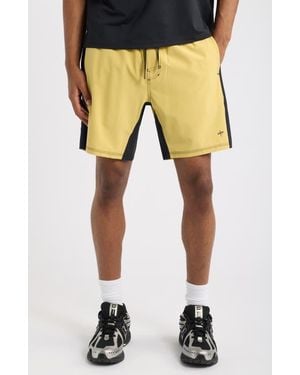 Saint Studio Tempo Wordmark Performance Shorts - Yellow