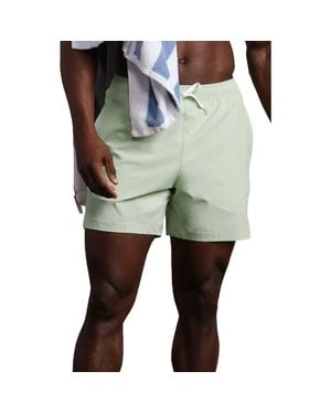 Rhone 5.5-Inch Water Repellent Swim Trunks - Green