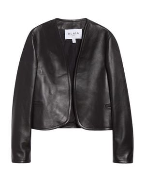 ジャケット ALAIA SPIRAL JACKET Asymmetric cropped denim jacket in blue - Alaia | Mytheresa