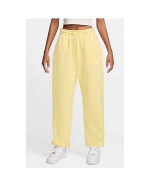 nike mini metallic swoosh oversized joggers in yellow