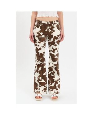 DAZE Lowkey Cow Print Flare Jeans - Multicolor