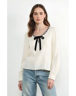 Modenaire Embroidered Blouse With Velvet Bow - White