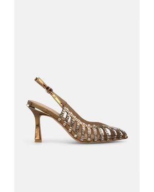Alma En Pena. Metallic Grilled Pumps - White